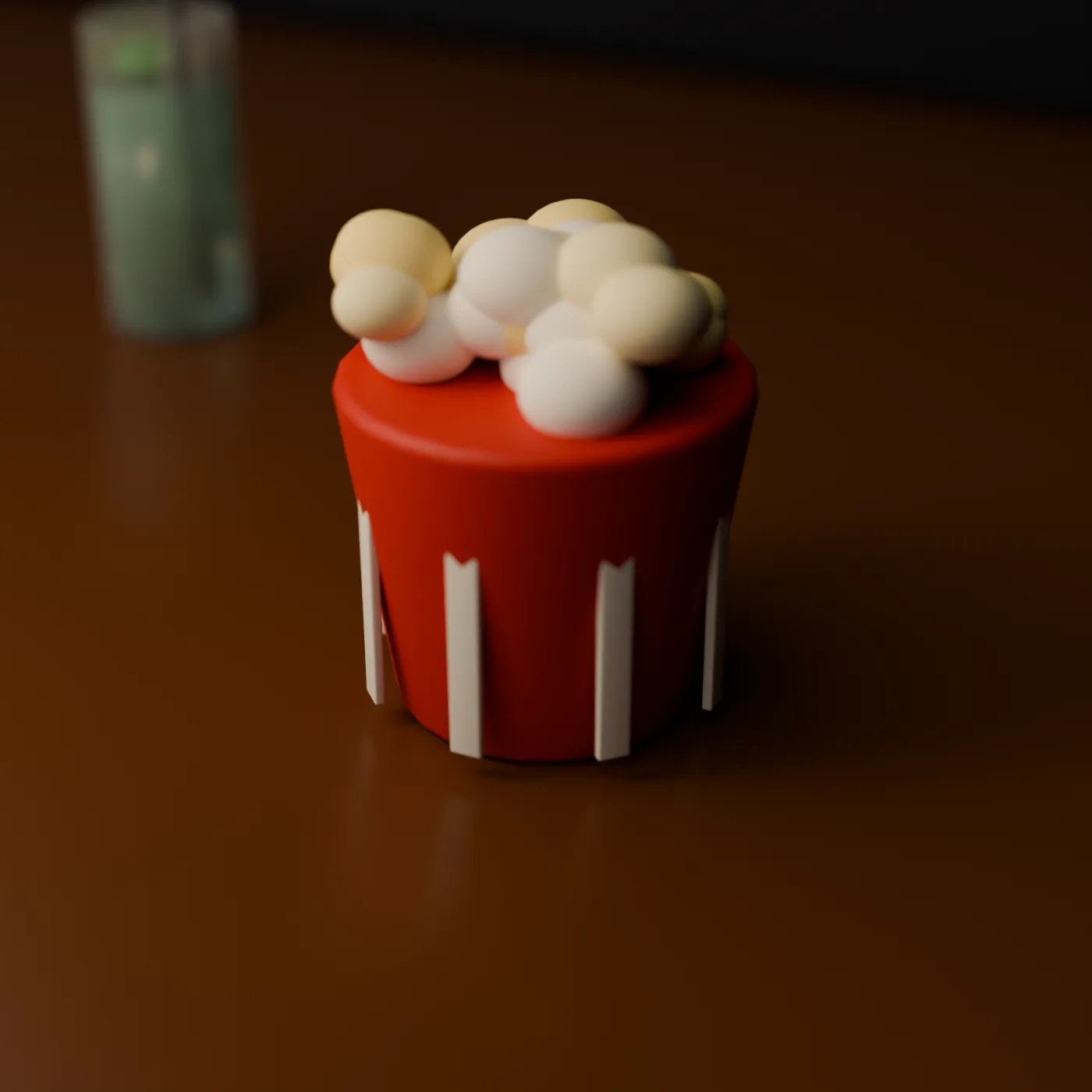 A red and white striped box of popcorn for the film