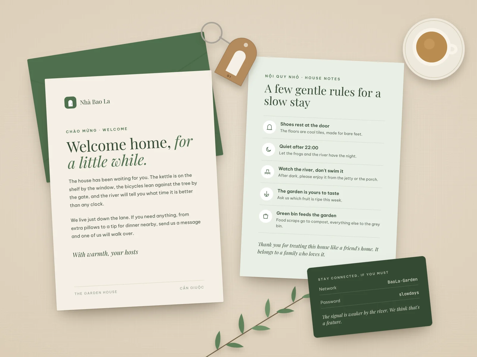 Concept printed guest welcome set for Nhà Bao La: a welcome letter, a card of gentle house rules, a Wi-Fi card and an arched-door key tag.